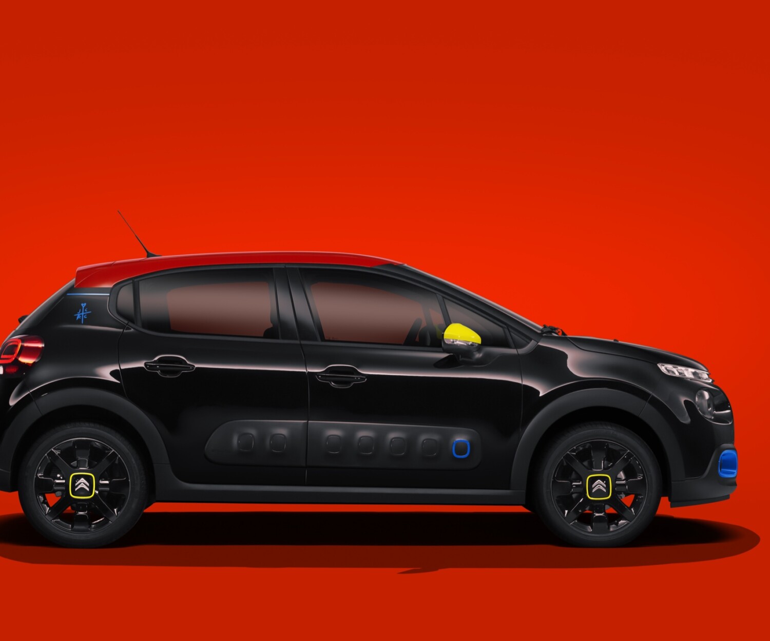 Citroën C3 JCC+ by Jean-Charles de Castelbajac — side profile on a red background