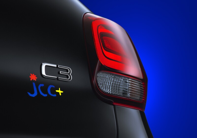 Citroën C3 JCC+ rear light and designer’s signature on a blue background