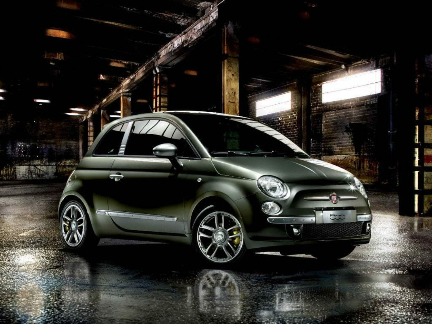 Fiat 500 by Diesel — front three-quarter view in an industrial warehouse