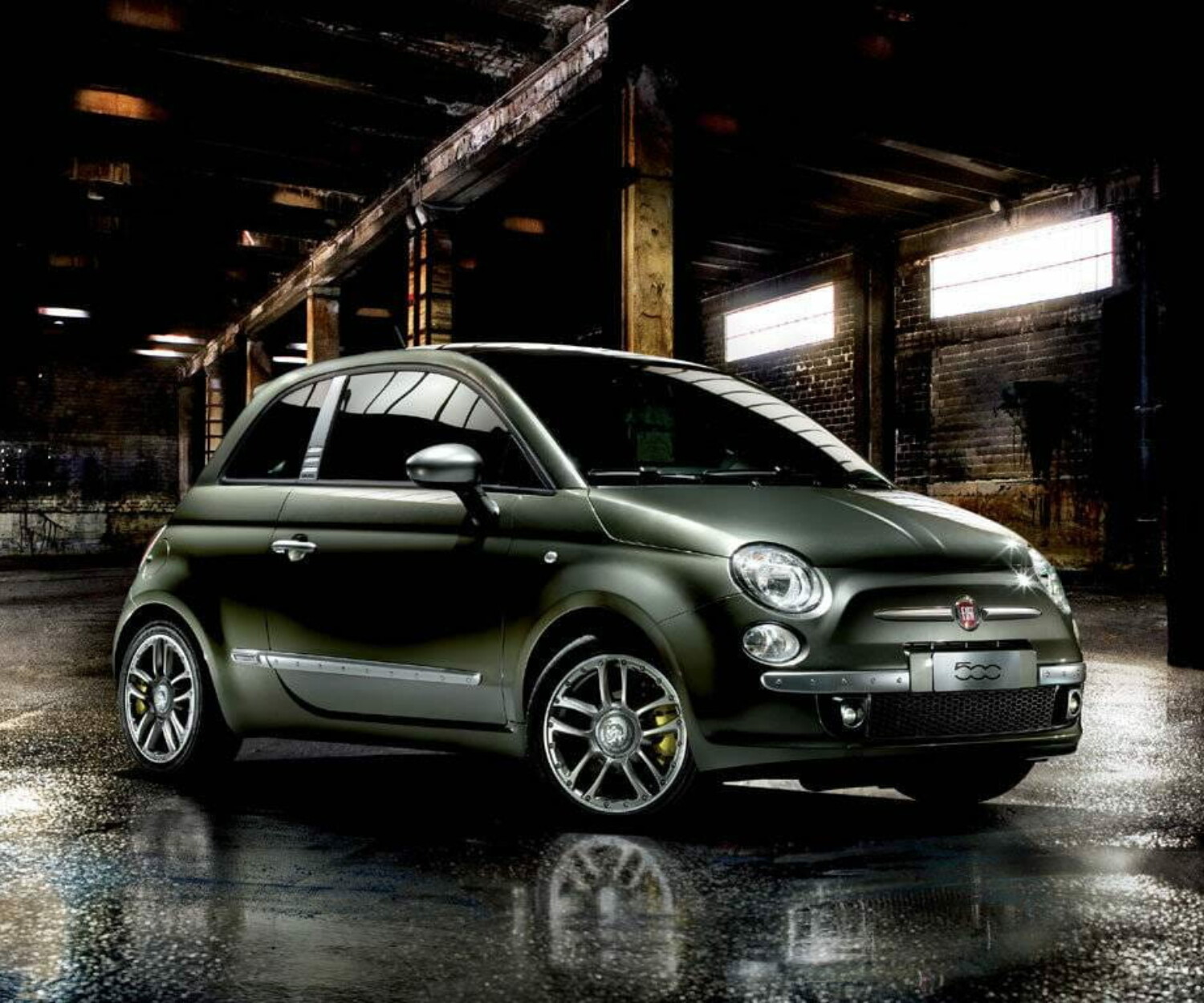 Fiat 500 by Diesel — front three-quarter view in an industrial warehouse